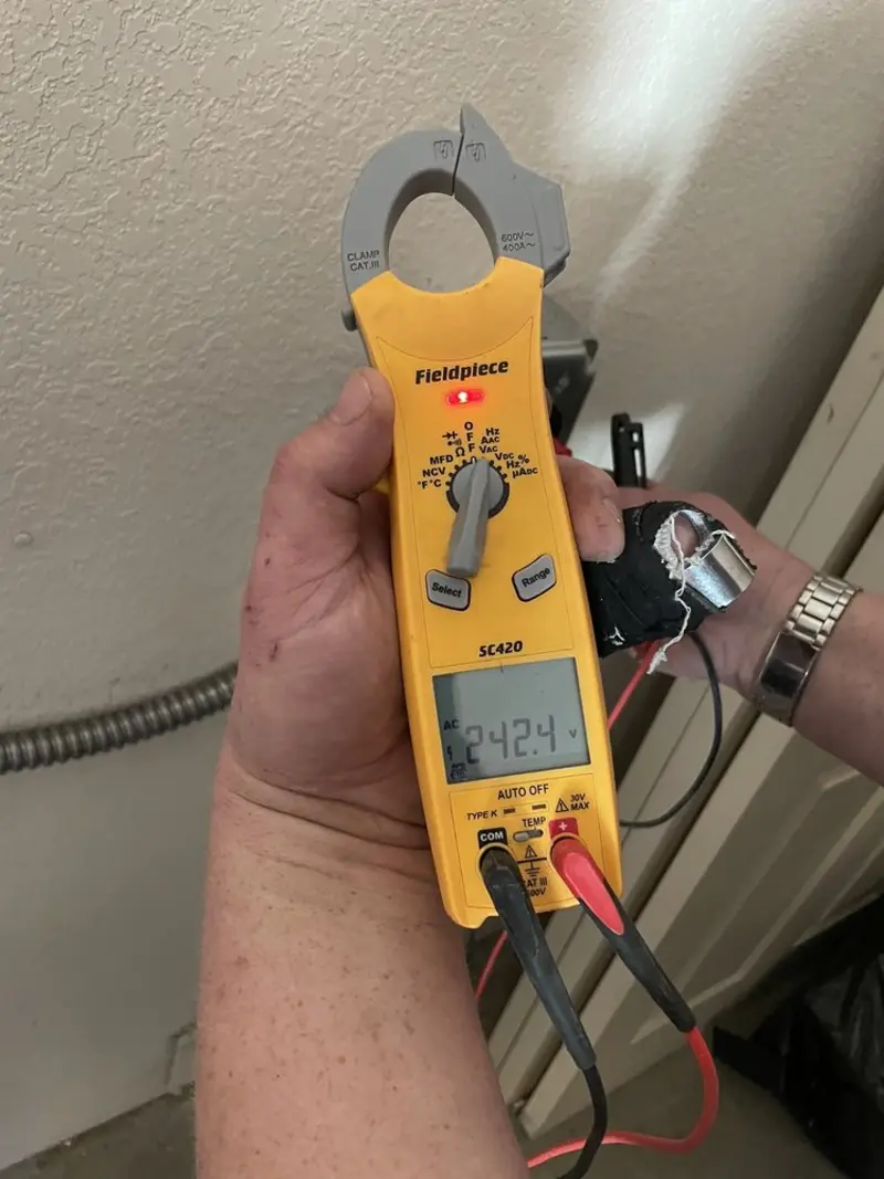 Voltage testing with clamp meter during Generator Installation in North Lauderdale